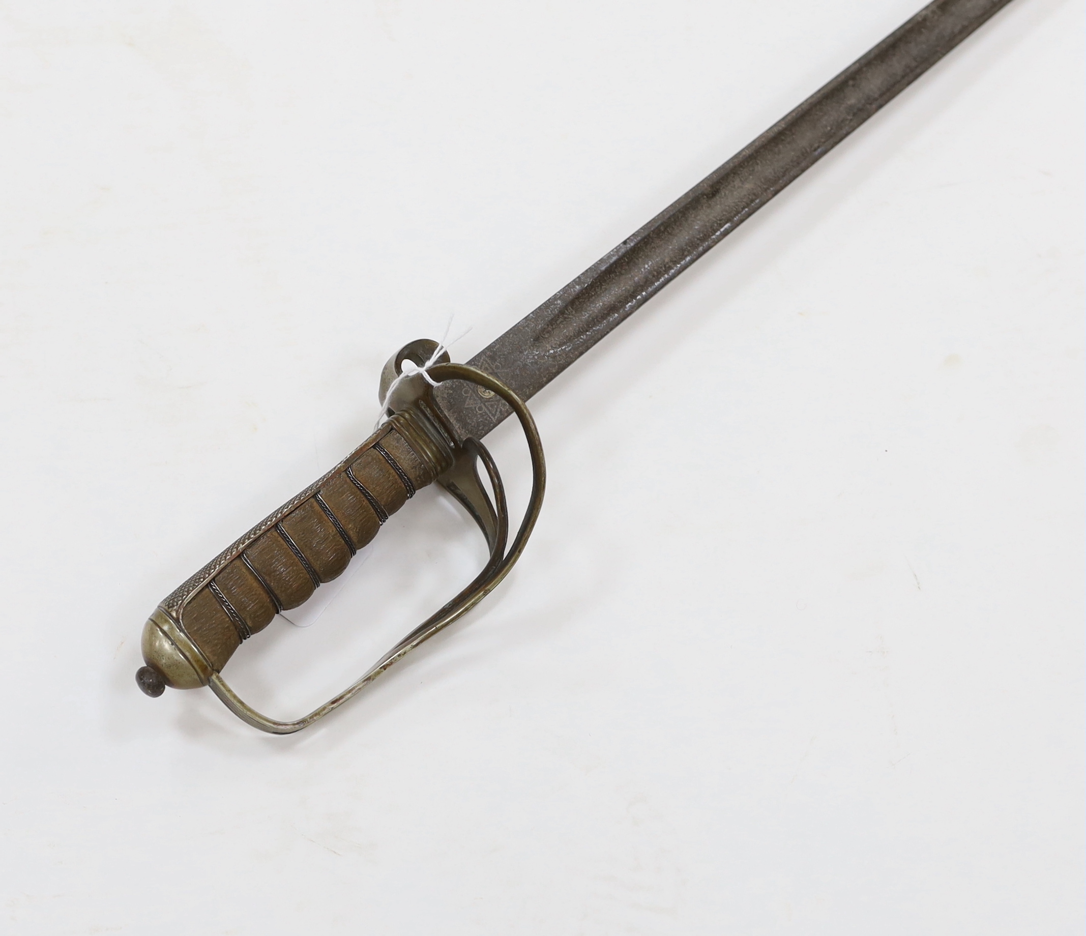 A World War I artillery officer’s sword with nickel guard, blade 82cm